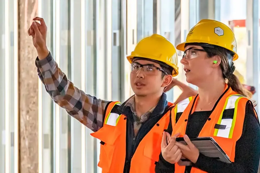 Engineers carrying out a QA/QC inspection using construction quality management software